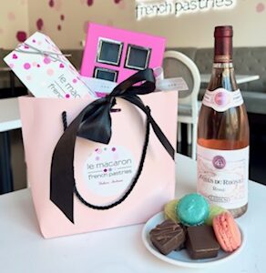 mother's day gift bag with chocolate, macarons, and wine at Le Macaron Fishers