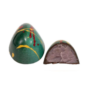 Hand-painted dark chocolate shell filled with white chocolate ganache infused with red wine and pear Williams extract at le macaron fishers
